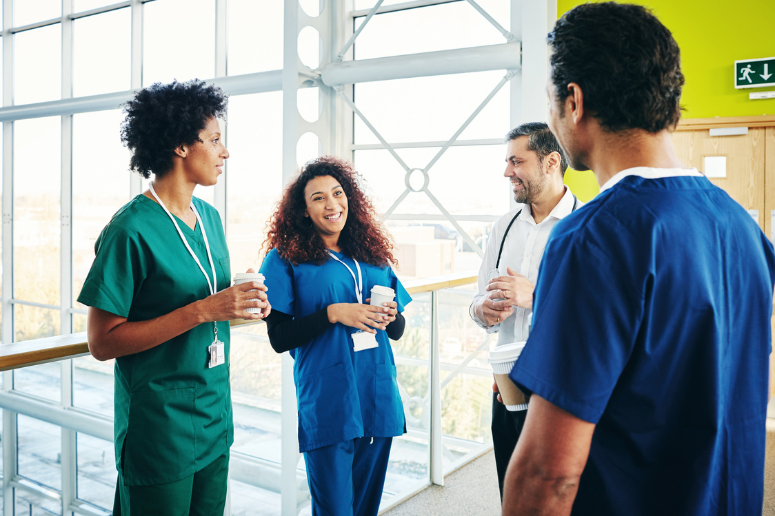 Group of doctors and nurses having a coffee break